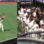 Bochy shows the crowd the World Series trophy