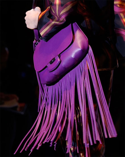 Gucci’s colorful handbags offer fringe benefits