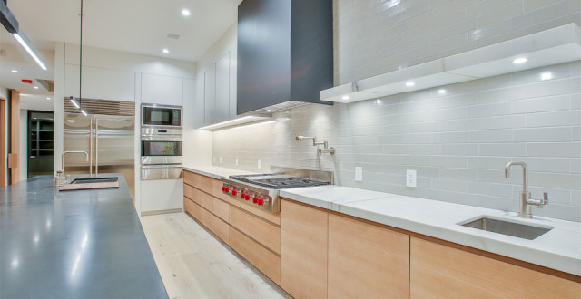 Once a run-down old home, 4173 now sports giant windows to let in the light, a modern facade and interior, including bright kitchens, skylights, and plentiful decks. photos: paragon real estate group