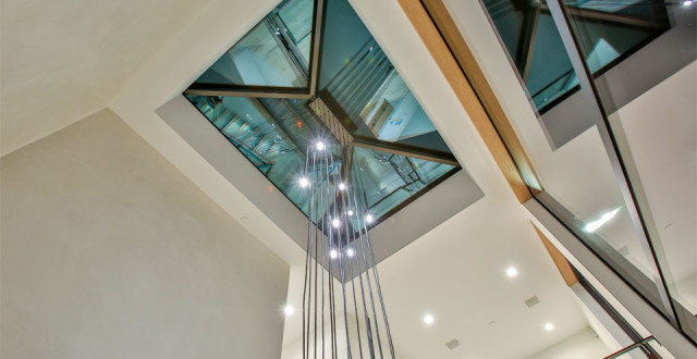 Once a run-down old home, 4173 now sports giant windows to let in the light, a modern facade and interior, including bright kitchens, skylights, and plentiful decks. photos: paragon real estate group