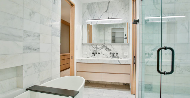 Once a run-down old home, 4173 now sports giant windows to let in the light, a modern facade and interior, including bright kitchens, skylights, and plentiful decks. photos: paragon real estate group