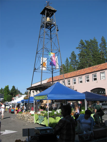 Placerville's historic bell tower rises above the farmers market. Photo: Bo Links