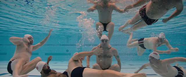 Action scene from Swimming with Men.
