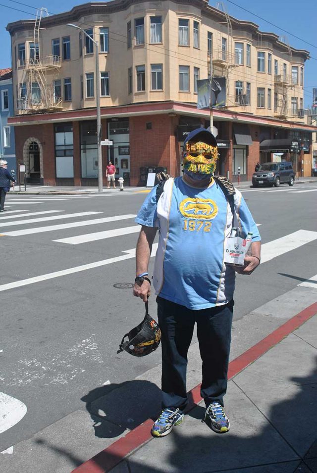 Proudly showcasing his homemade “Be Happy” protective gear, Andrew Michael of Partnerships for Change, a nonprofit located in the Presidio focused on the essential work of women’s health, says he hopes to spread some cheer with his crafty look.