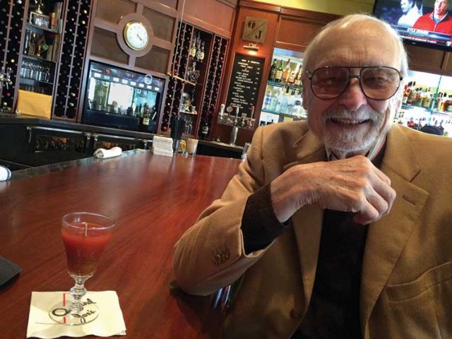 Author Ernie Beyl enjoying a Bloody Mary at Original Joe’s in 2018. image: staff photo