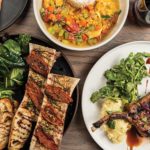 Bone marrow, tiger prawns, and pork chop at Wilder. Photo: Albert Law