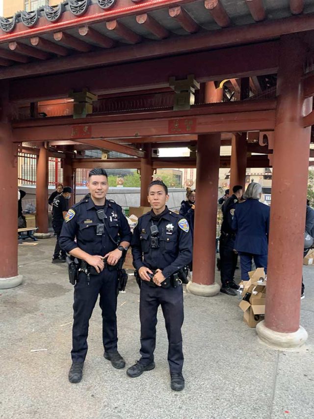 SFPD Officers William Ma (left) and Loren Chiu (right) at the 2021 Chinatown Night Out event held at Portsmouth Square, Photo: Anh L