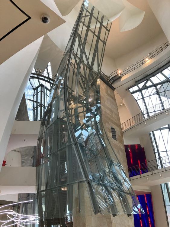 The soaring interior of the Guggenheim Bilbao. Photo by Bo Links