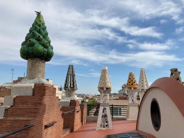 The whimsical rooftop chimneys at Palau Güell- Diputació de Barcelona. Photo by Bo Links