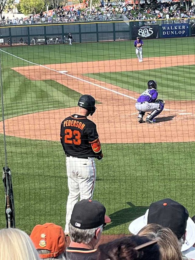 Giant Joc Pederson sizing up the Rockies pitcher. Photo: Steve Hermanos