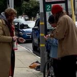 Nathaniel Roye (left) Garret Doty (right, red cap) buy drugs in the Marina District.